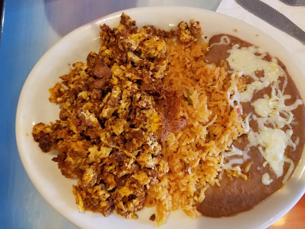 Scrambled Eggs with Chorizo Served with Rice & Beans